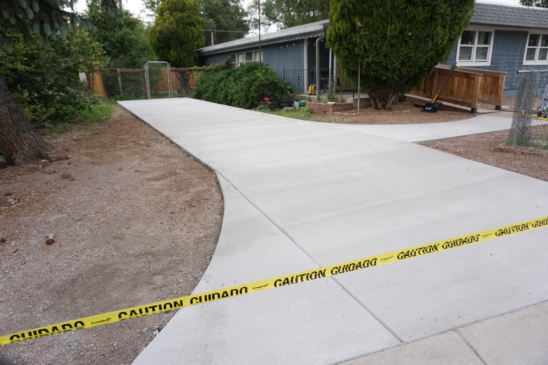 Concrete driveway installed by AMC Construction